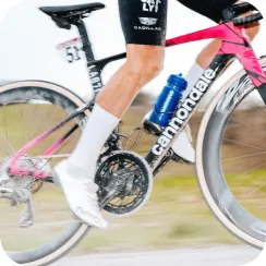 Close up view of the pedal on a bike in motion showing exceptional durability